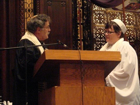 Rabbi Steve Chester passes the Torah to me (again) at ordination (5/18/08)